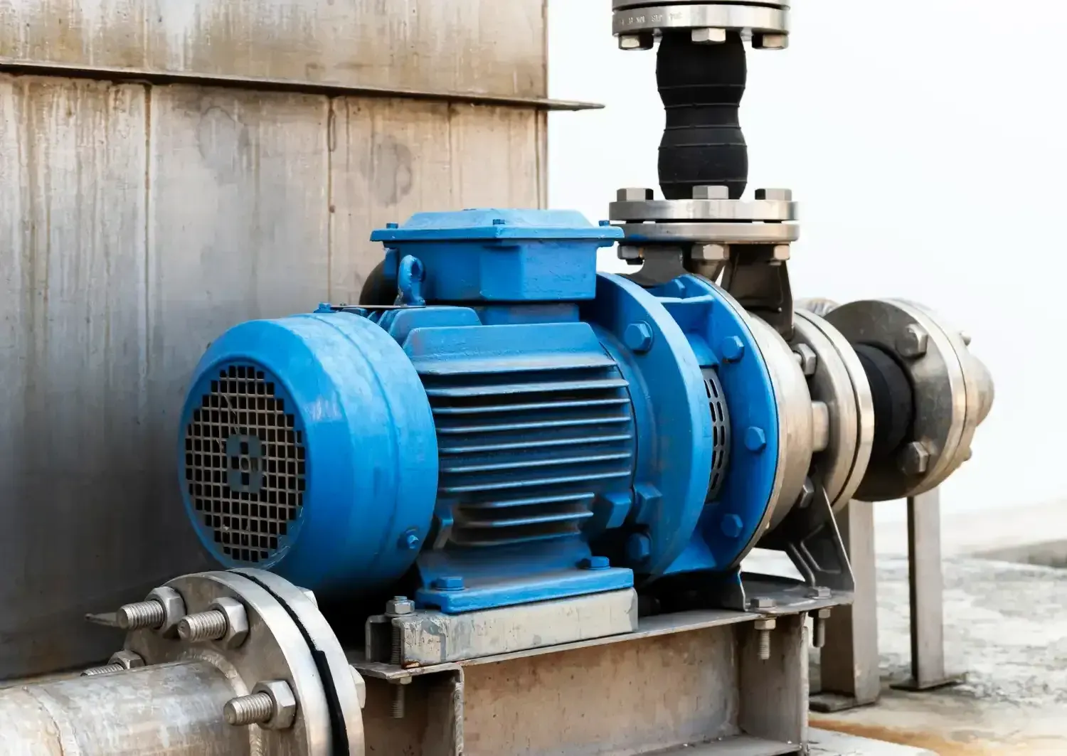 Blue water pump serviced by a technician